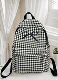 Black Coquette Bow Checkered Backpack