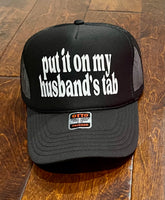 Put it on My Husband’s Tab Trucker Hat