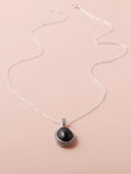 Black Pendant on Silver Necklace